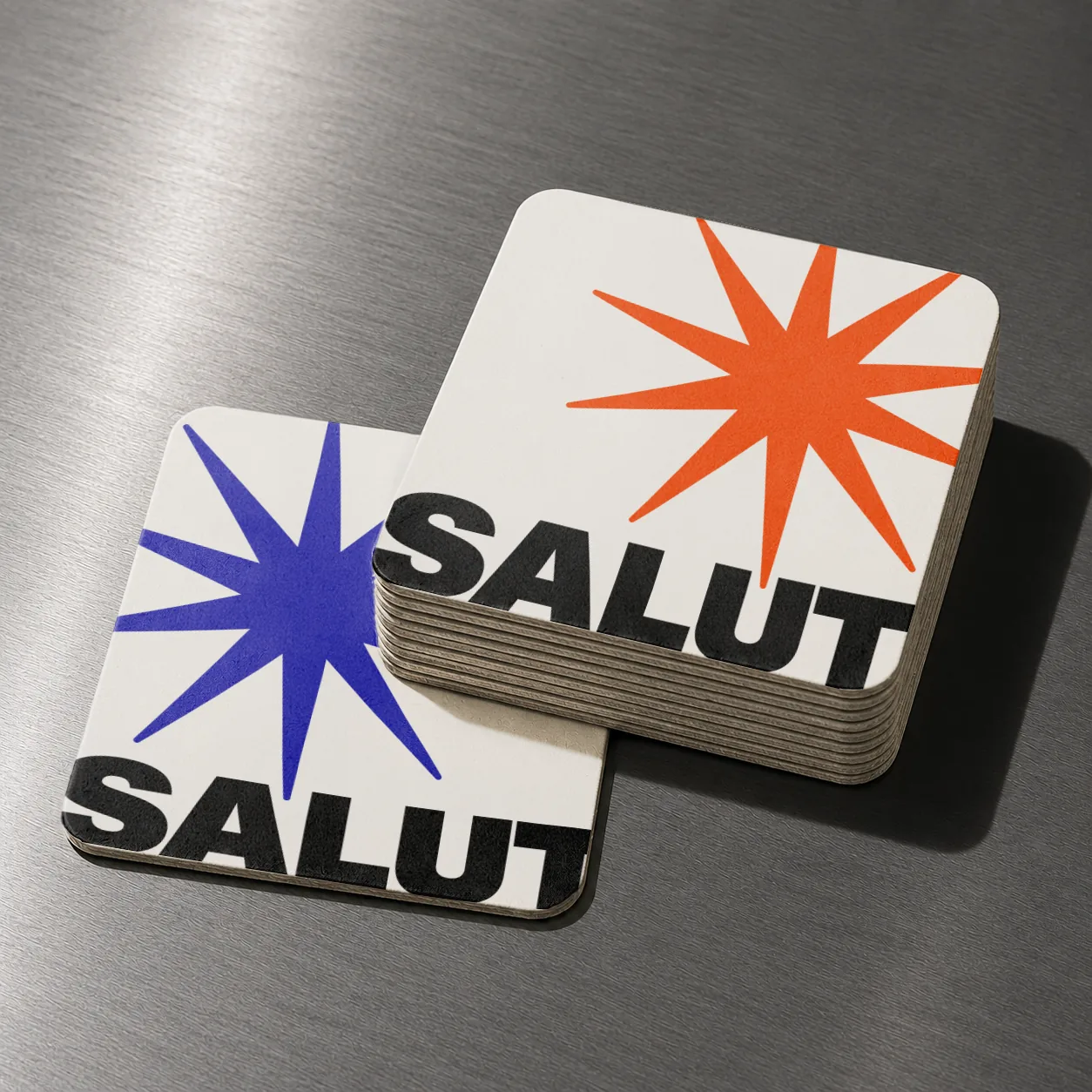 Salut — posavasos con estrella en azul y naranja